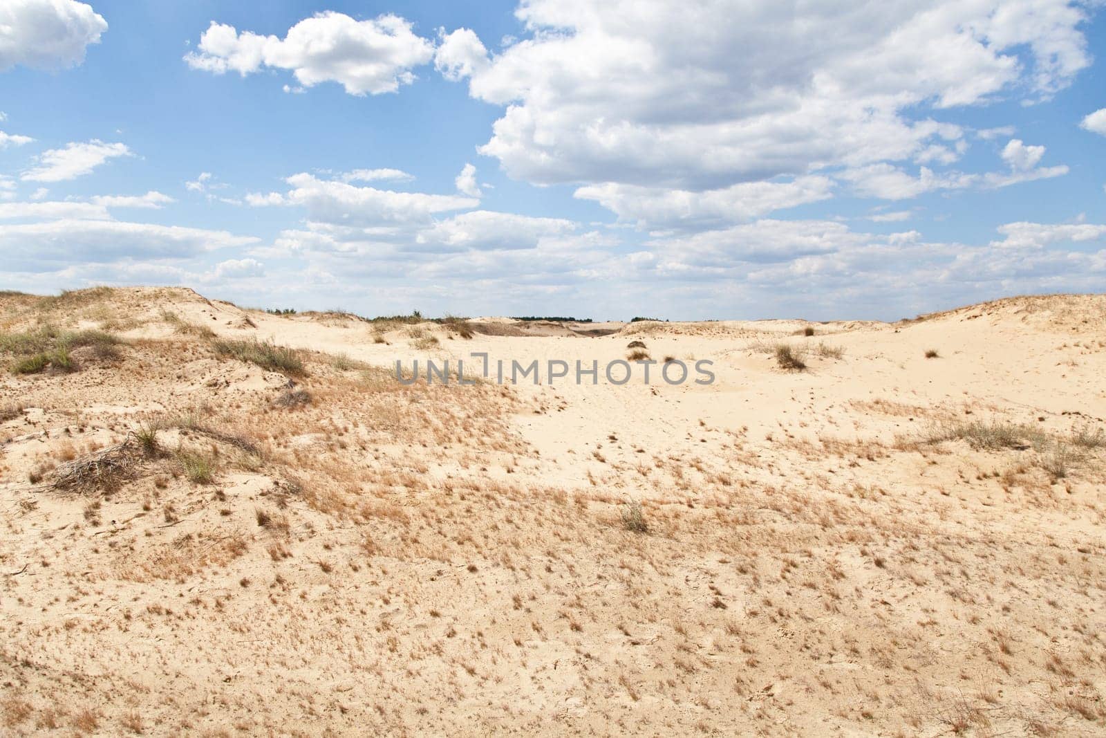 Desert view with sky and lot of clouds