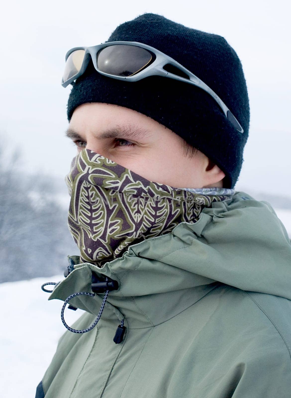 Hiker at the mountains covered with snow