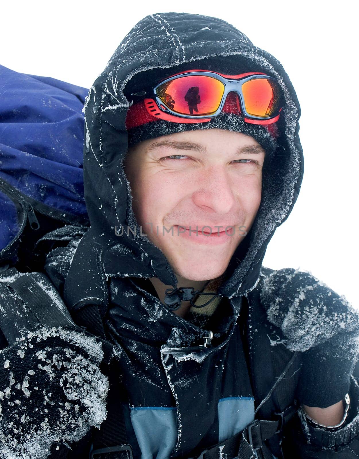 Hiker at the mountains covered with snow