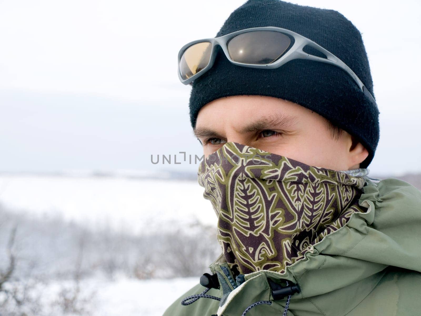 Hiker at the mountains covered with snow