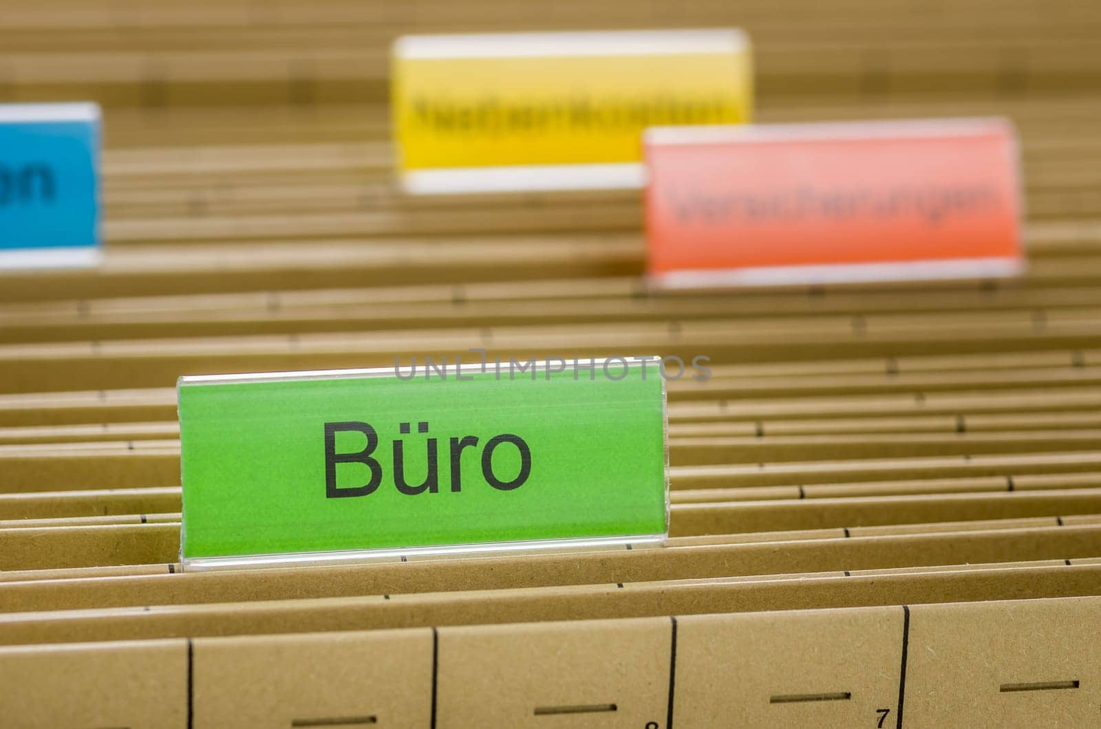 Hanging folders with the inscription Office