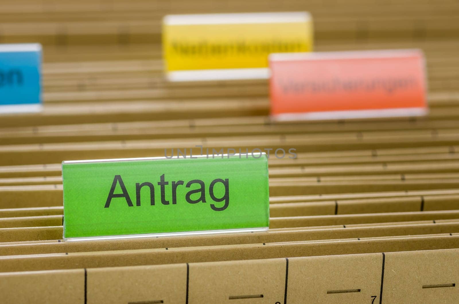 Hanging folders with the inscription Application