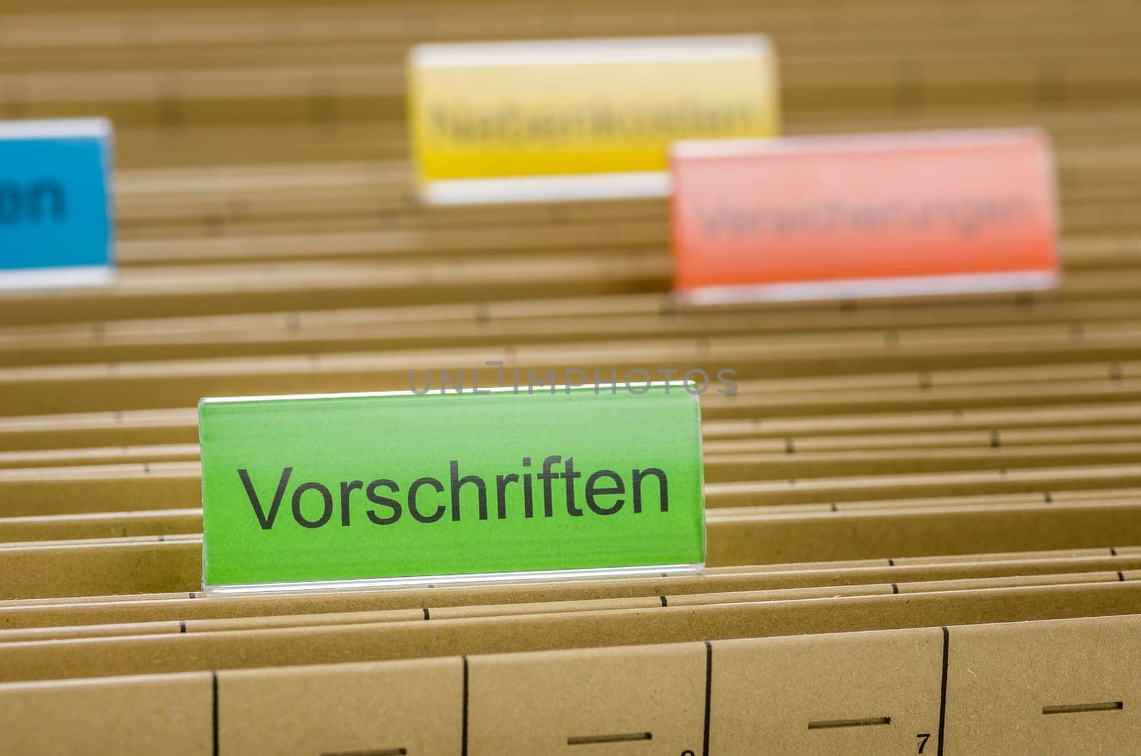 Hanging folders with the inscription Regulations