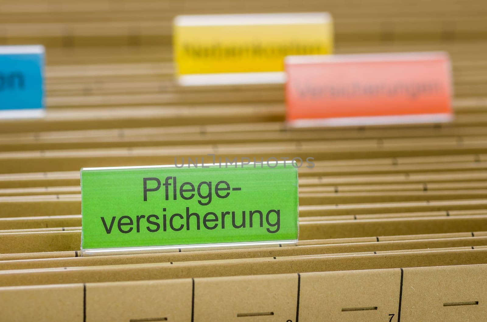 Hanging folders with the inscription long-term care insurance