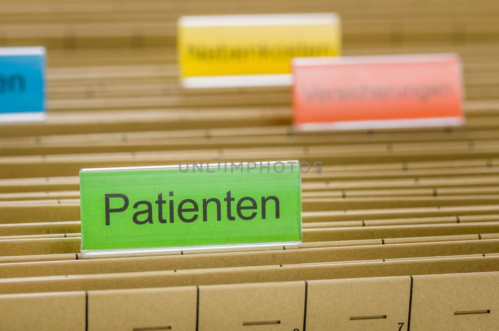 Hanging folders with the inscription Patients