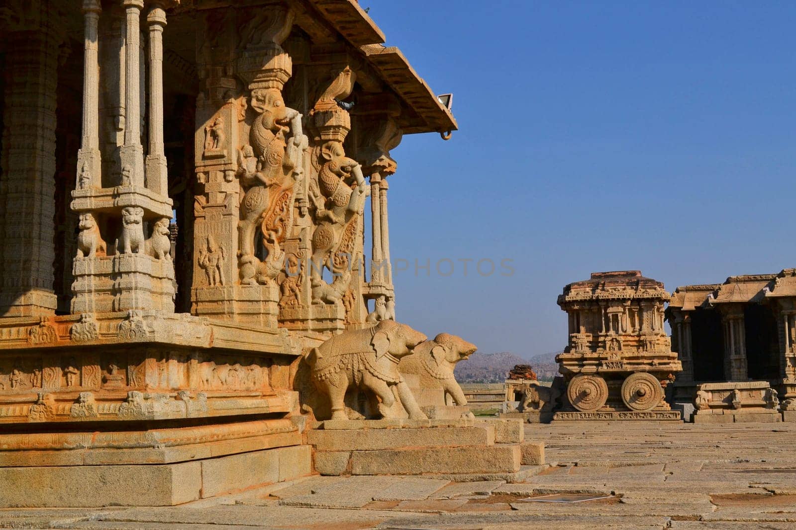 Ornate stone chariot in the Vittala temple in Hampi, Karnataka, India