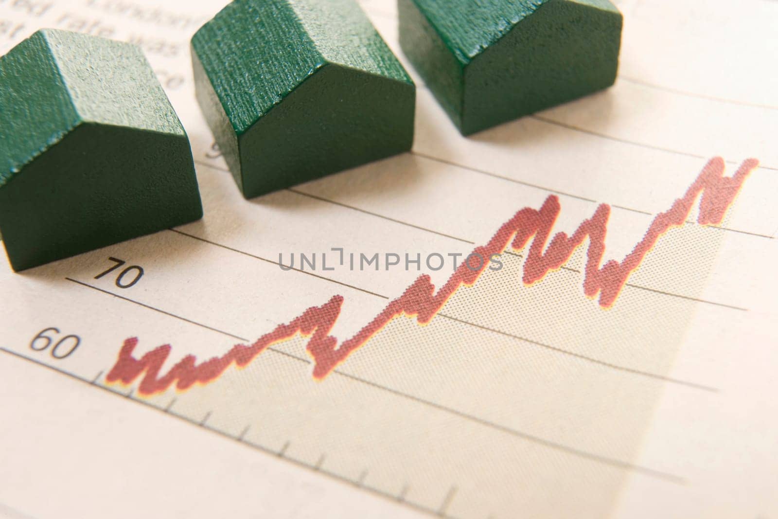 graph in a paper with wooden houses