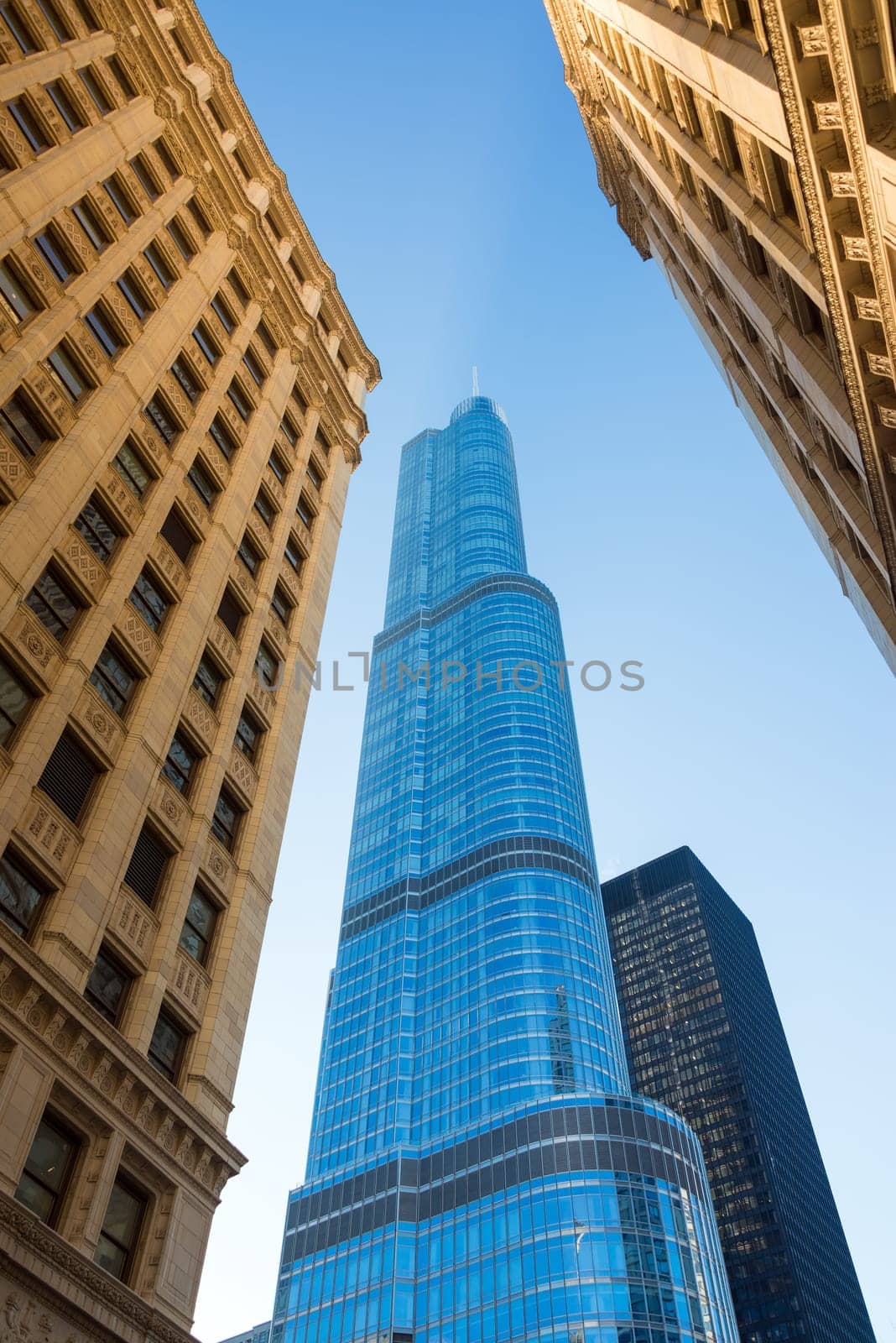 Looking up at towering skyscrapers in downtown Chicago