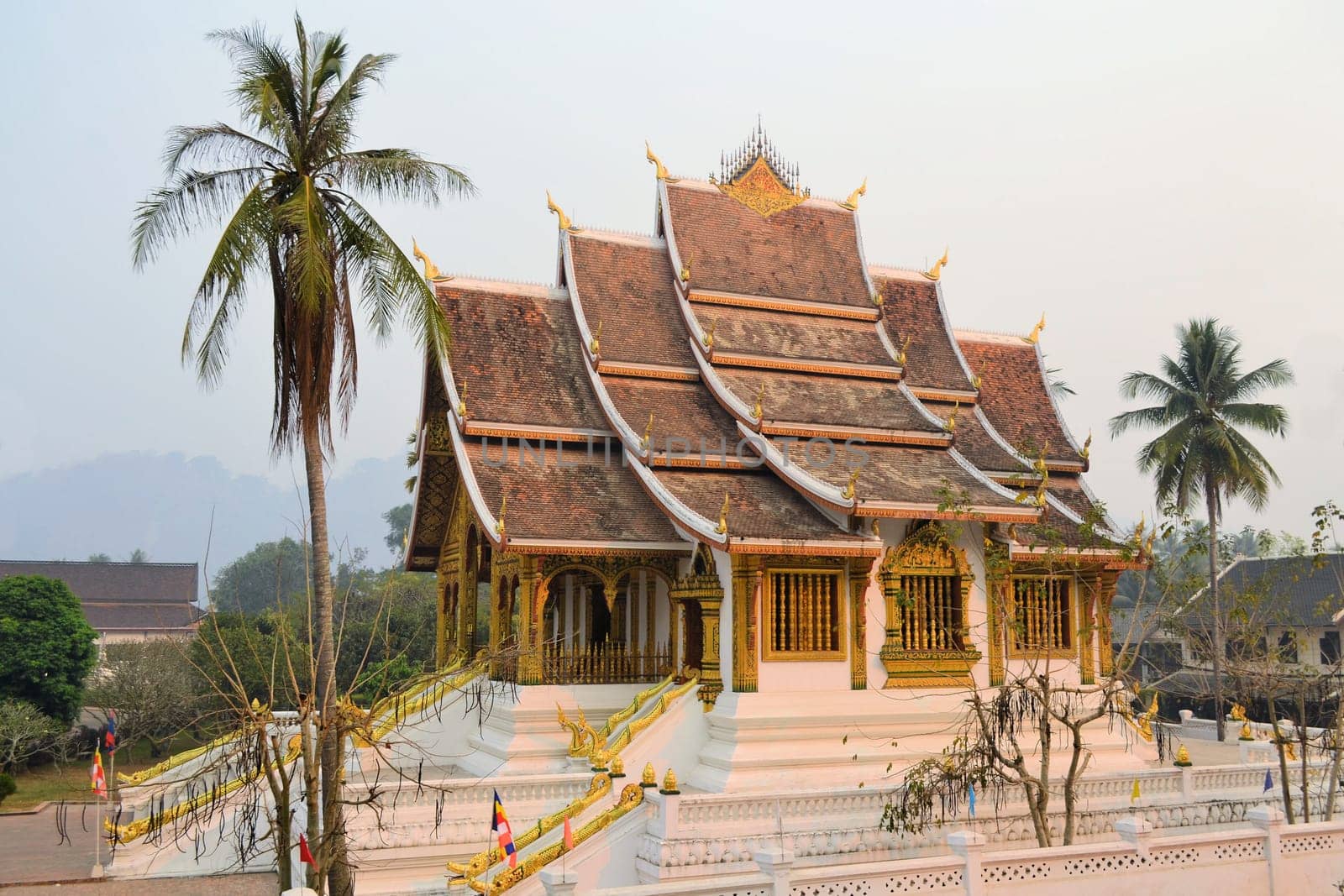 Ancient Buddhist temple in typical Laotian architecture in Luang Prabang, Laos