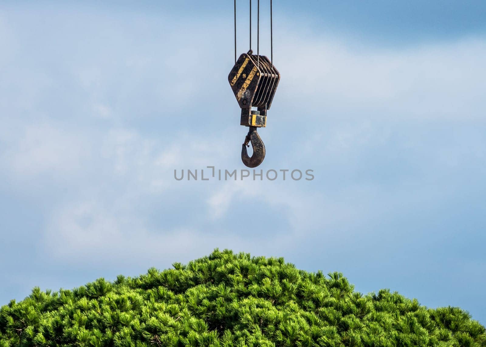 Red yellow crane hook working