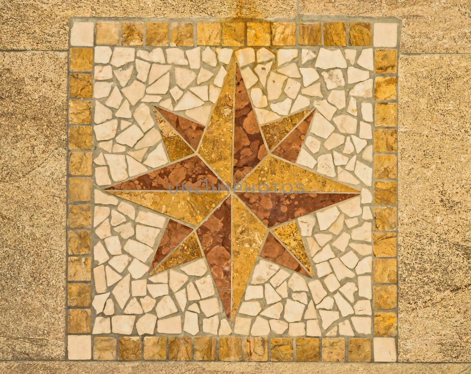 Wind rose made with ceramic pieces like a mosaic