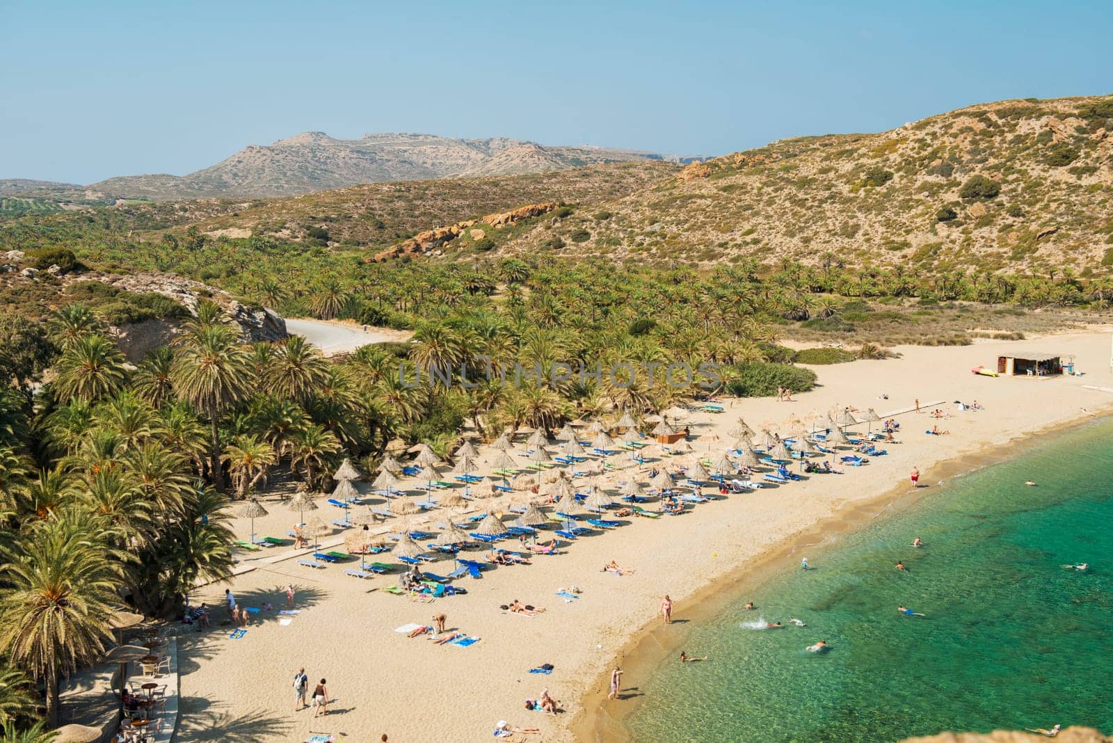 The is one of the the most beautiful place  of the Mediterranean island of Crete. It features the largest natural palm forest in Europe.  The beach of Vai is beautiful but nowadays it is entirely fenced off and covered in beach beds and umbrellas. This certainly reduces its charm, especially when you add the masses of visitors.
