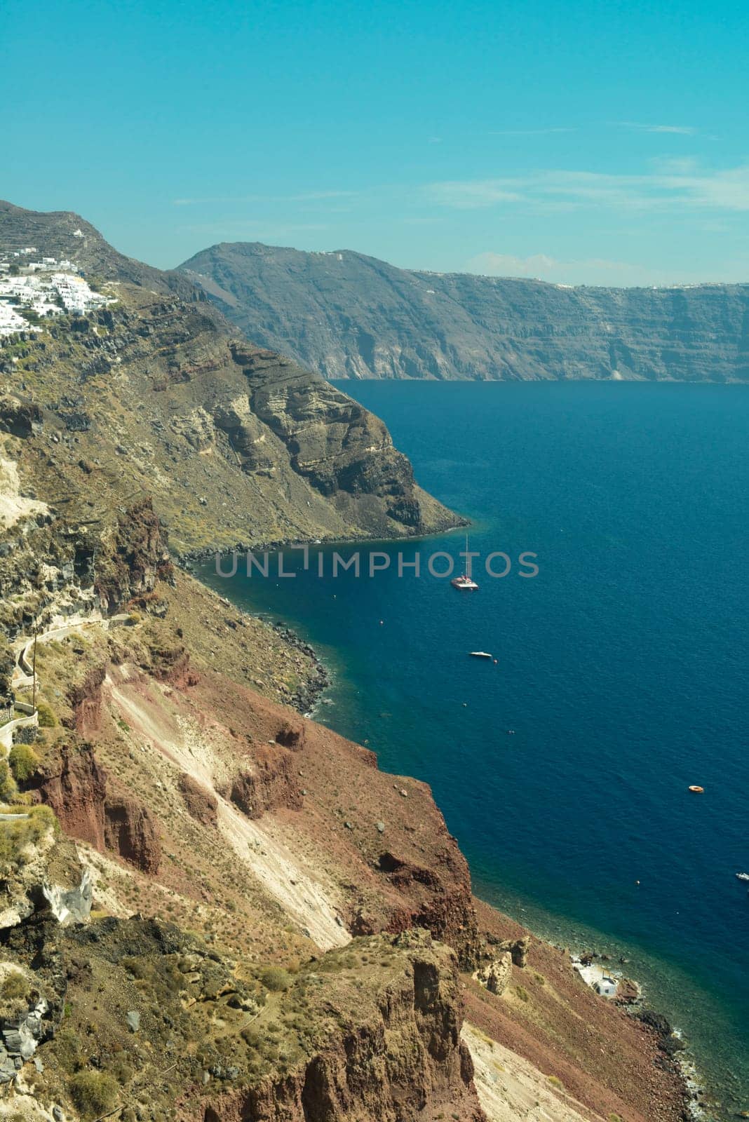 View on rock coastline on Santorini island, Greece.