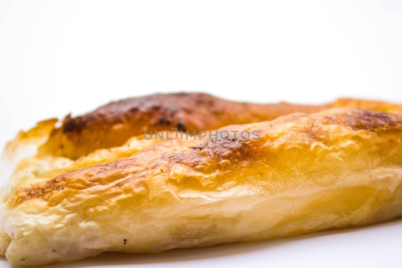 Delicious looking breakfast. Baked pastry with cheese.