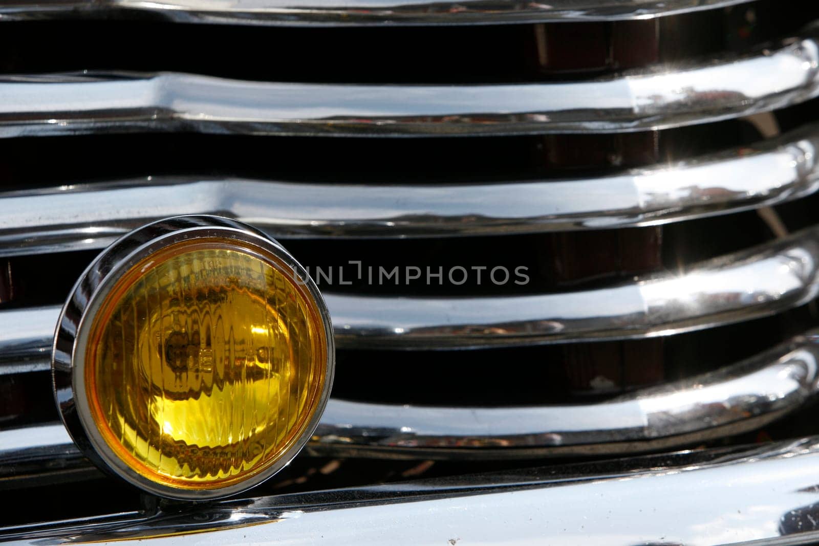 Headlights of a classic car