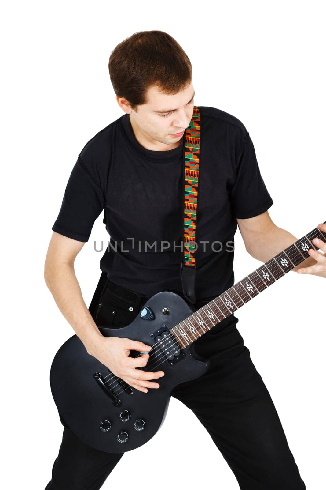 Man in black clothes with an electric guitar