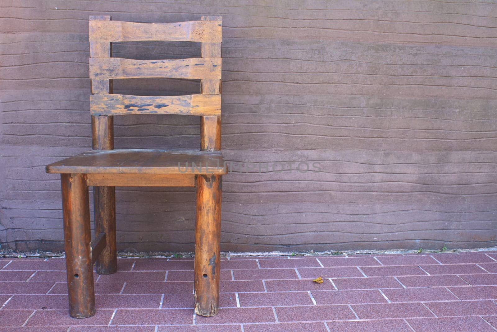 wooden chair standing on the terrace