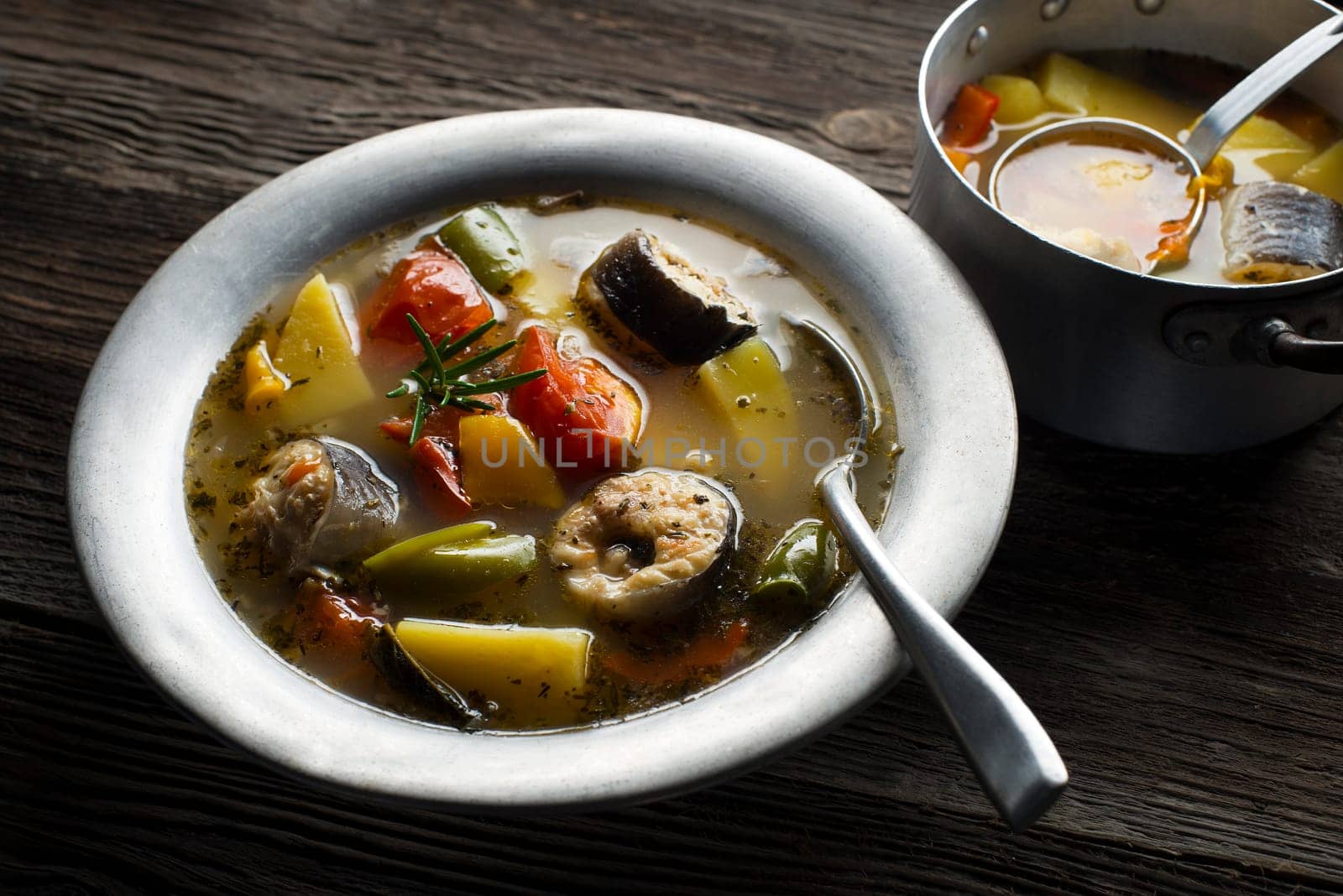 Healthy hot fish stew close up shoot