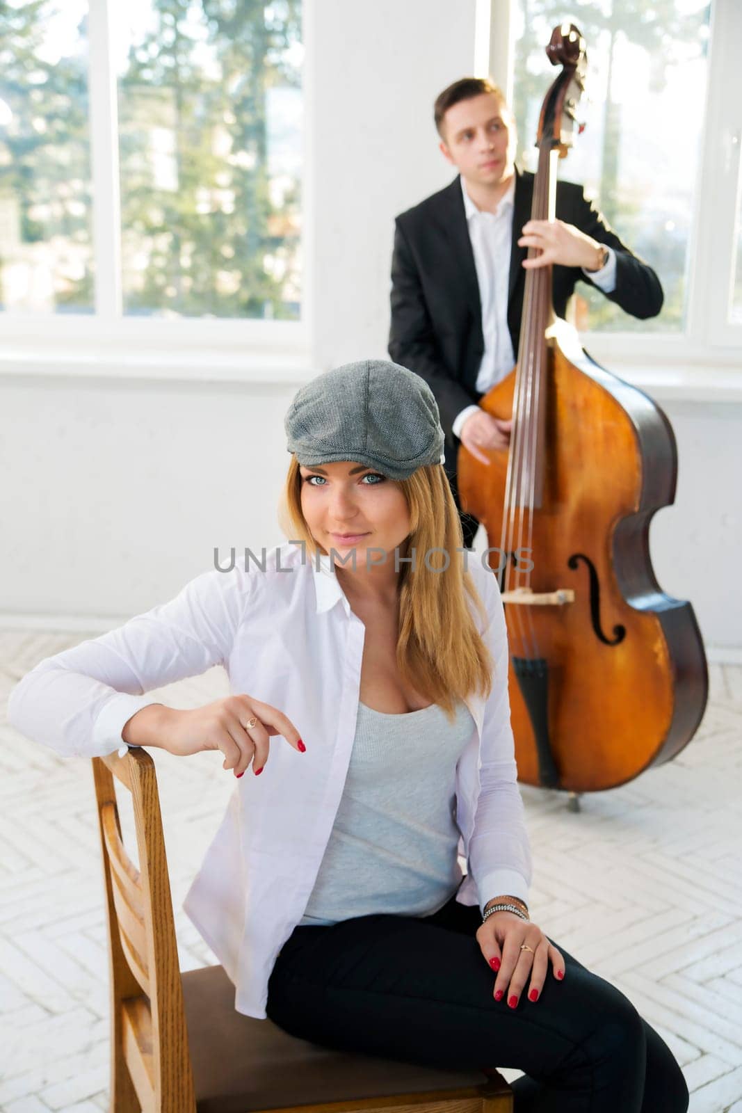 Charming woman at sunny day with grey hat