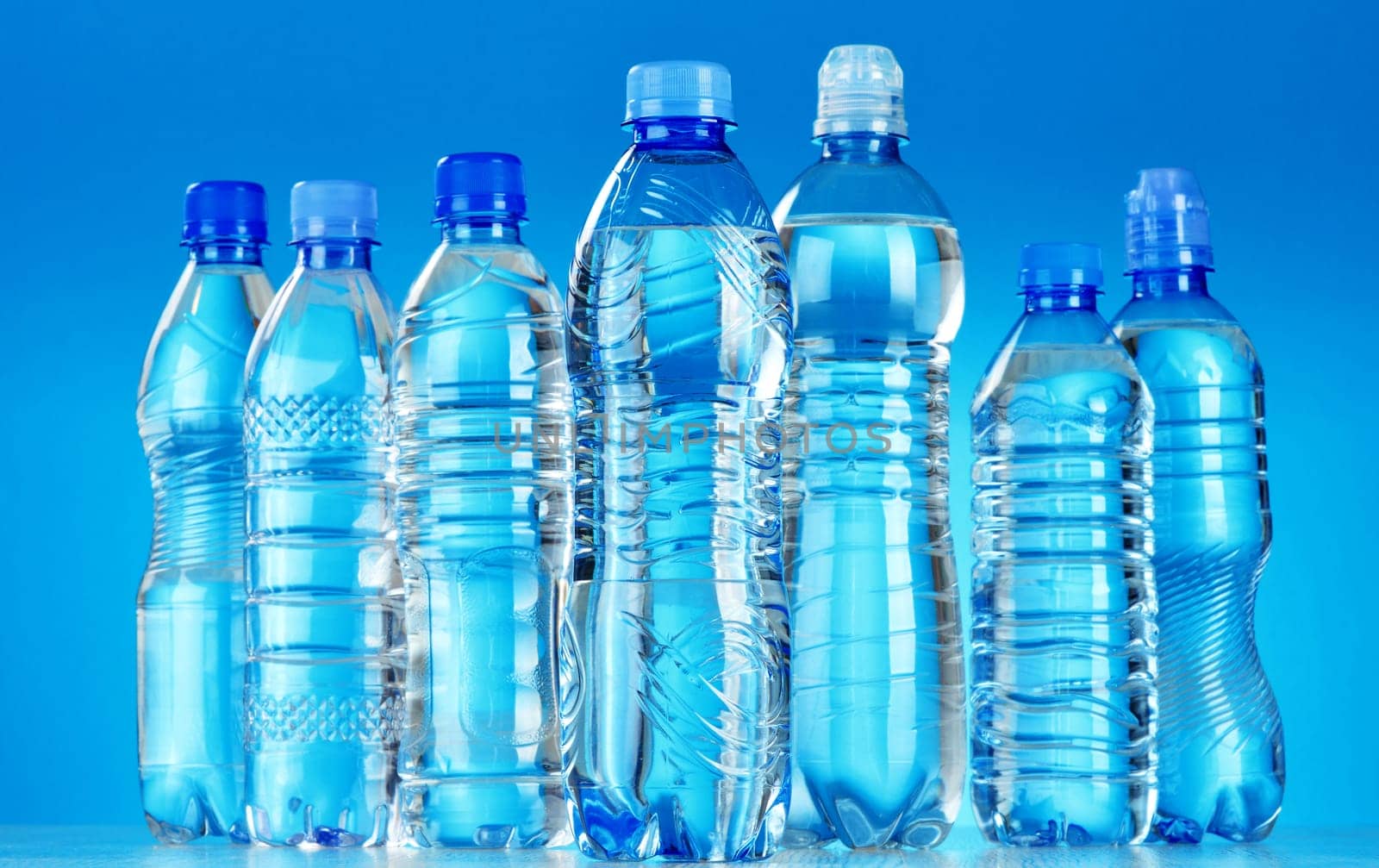 Composition with assorted plastic bottles of mineral water