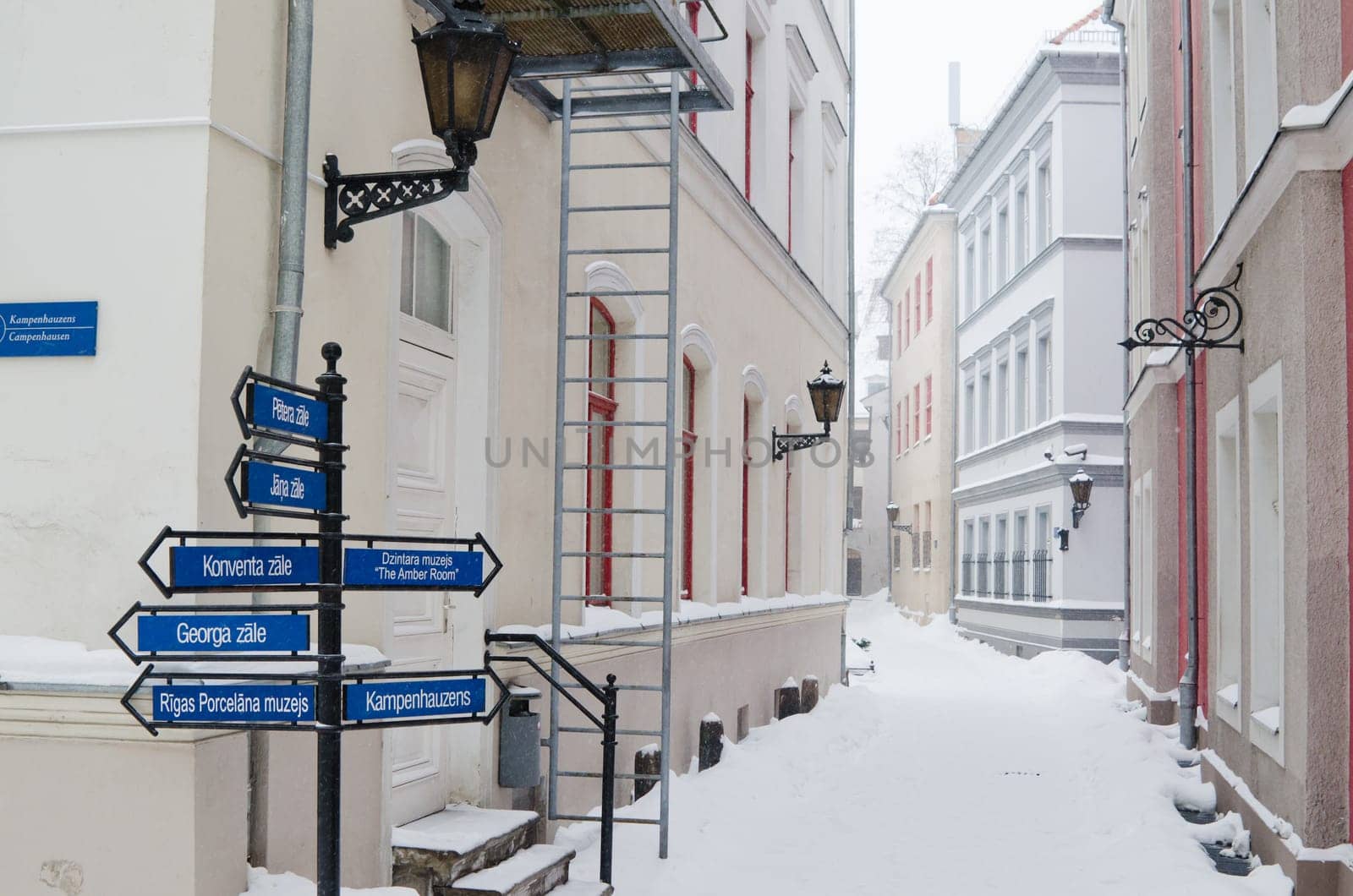 Street of Old Riga in snow day before Christmas