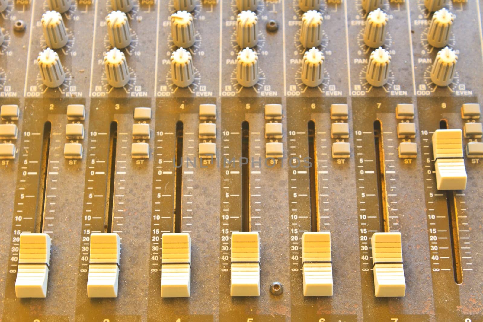sound studio adjusting record equipment