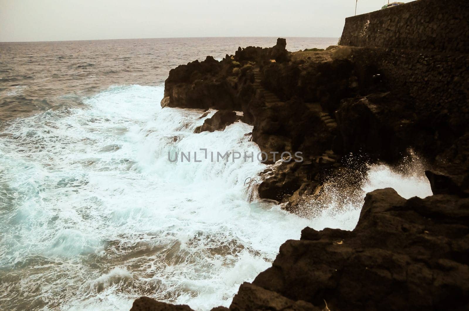 Strong Waves Crashing on the Volcanic Coast in Tenerife Canary Islands