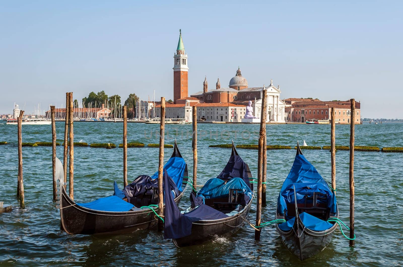 Gondolas in Venice, Italy, with St George Island in the background.