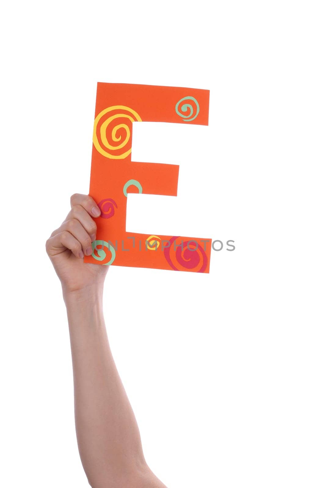 A Hand Holding a Colorful E, Isolated