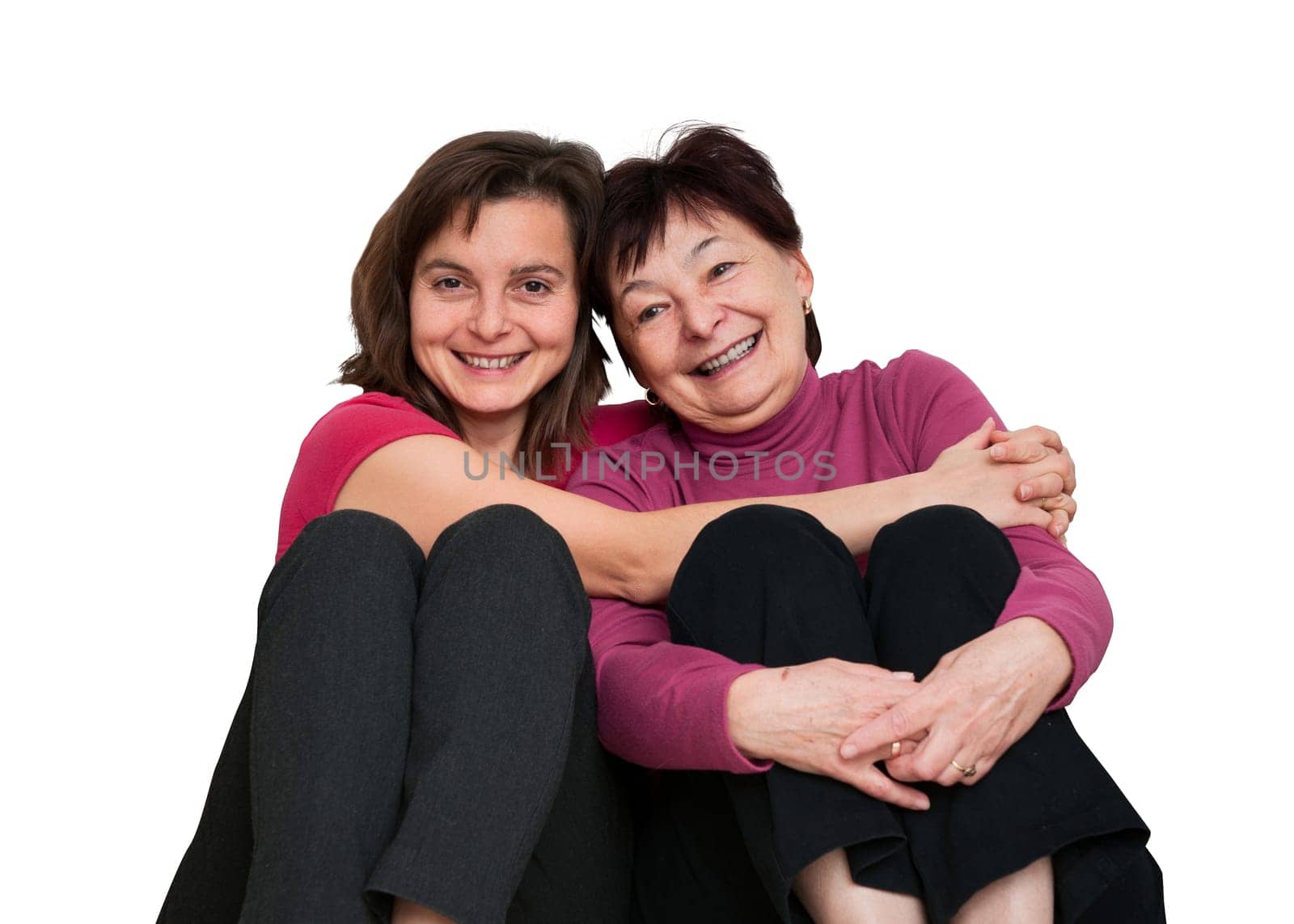 Portrait of daughter with happy senior mother  - isolated on white