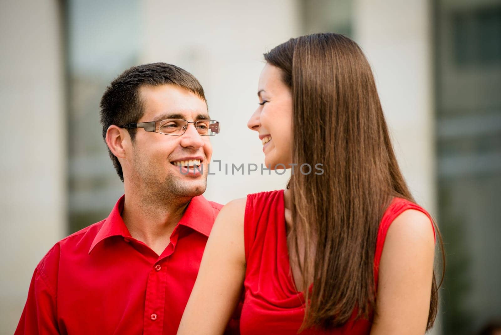 Lifestyle photo of young business people having great time together outdoor in street