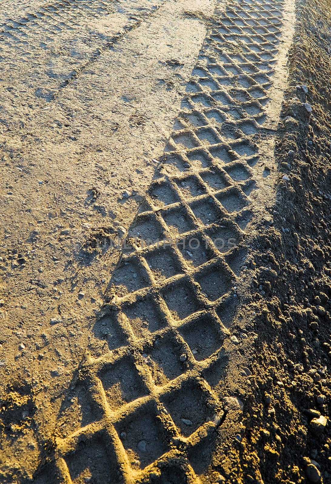 Tyre tread pattern in the ground