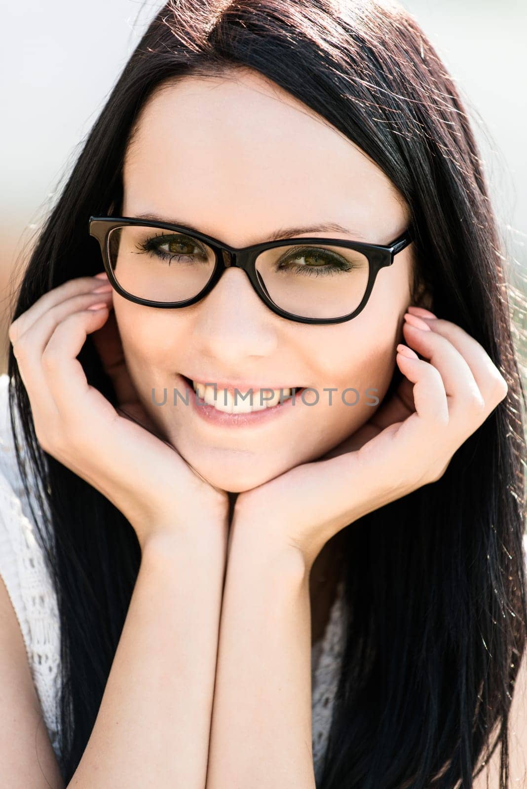 Young beautiful woman with glasses - outdoor portrait