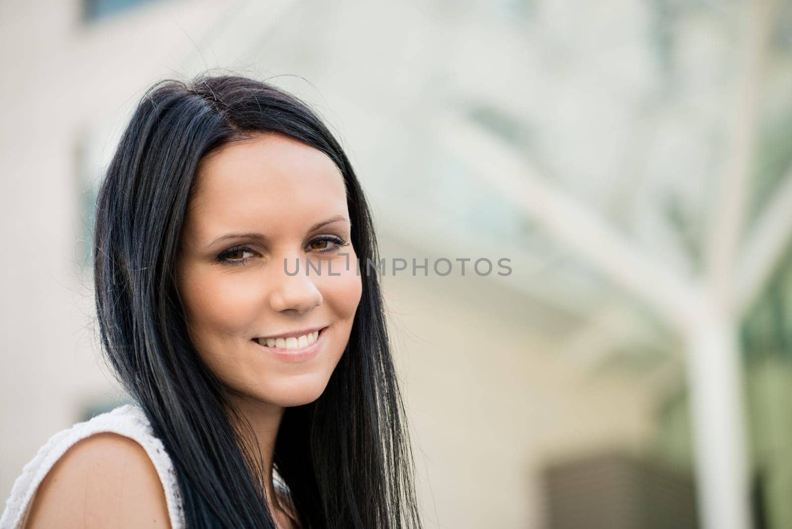 Portrait of young beautiful woman - outdoor with copy space