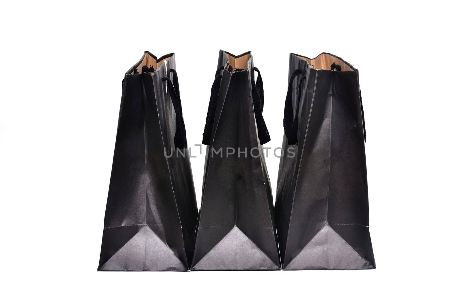 black paper bag isolated on white background