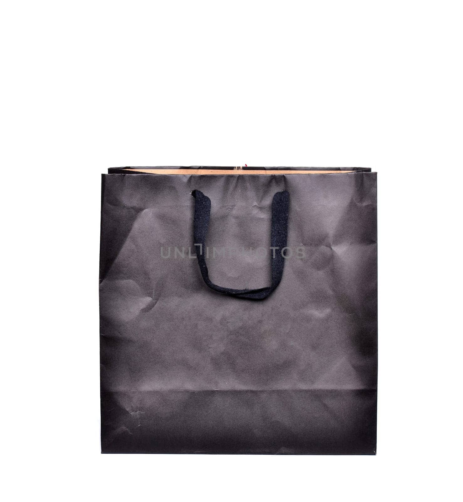 black paper bag isolated on white background