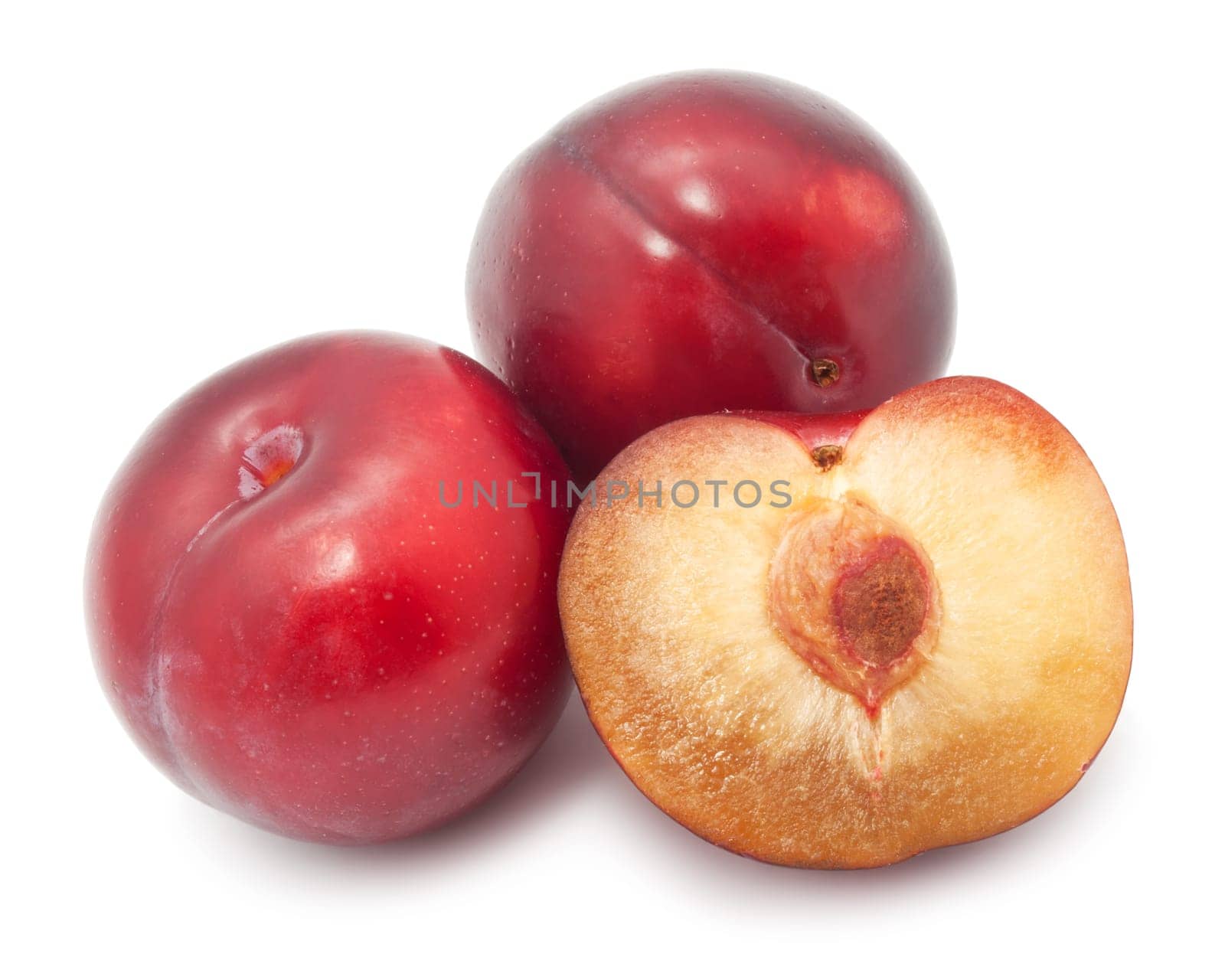 Fresh tasty plums isolated on white background