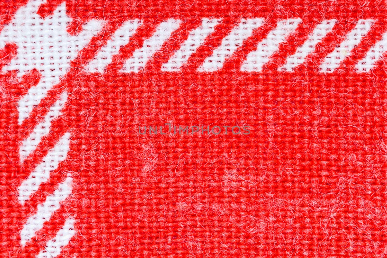 horizontal red cloth texture with ornament. macro