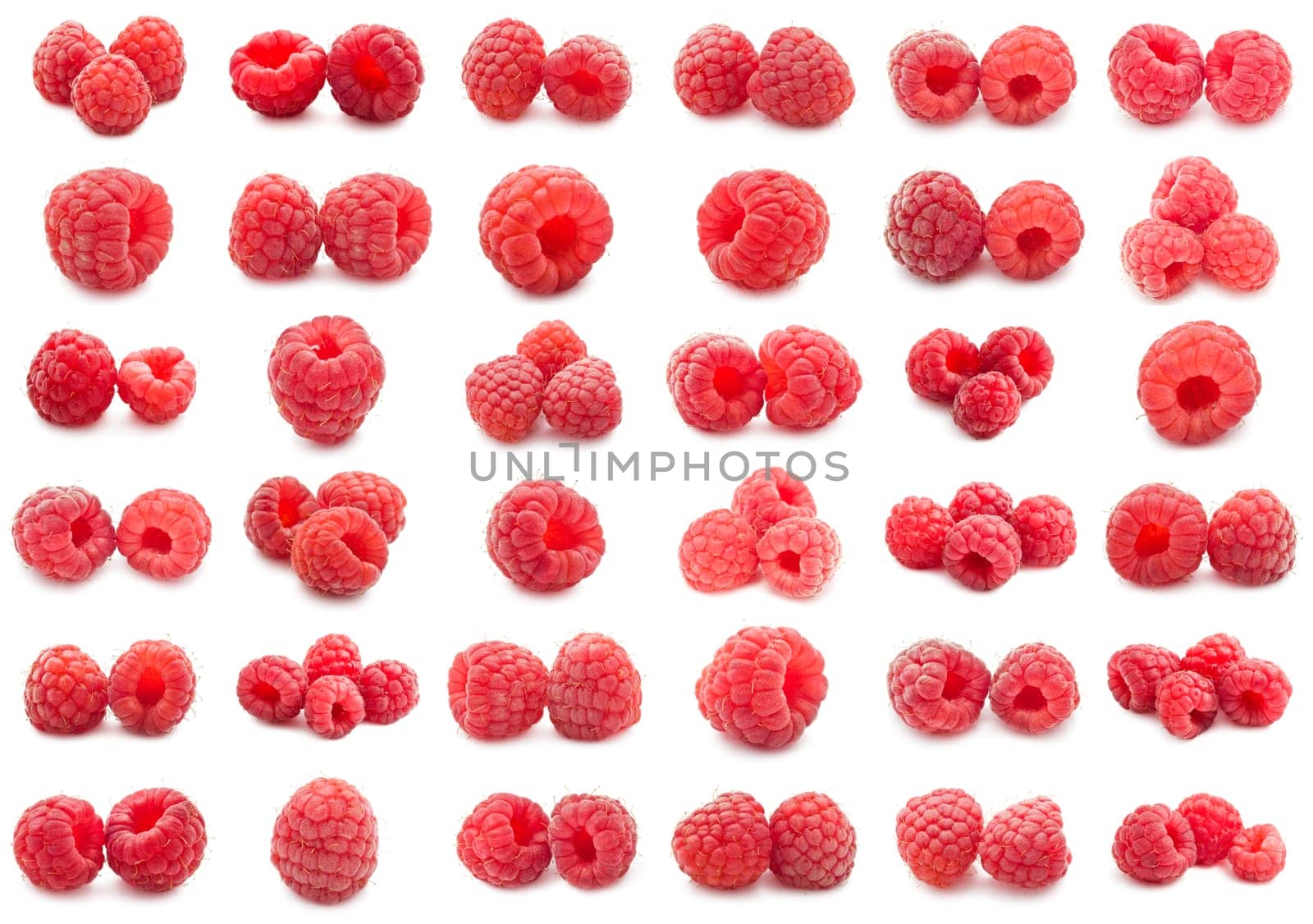 Collection of ripe red raspberries isolated on white background