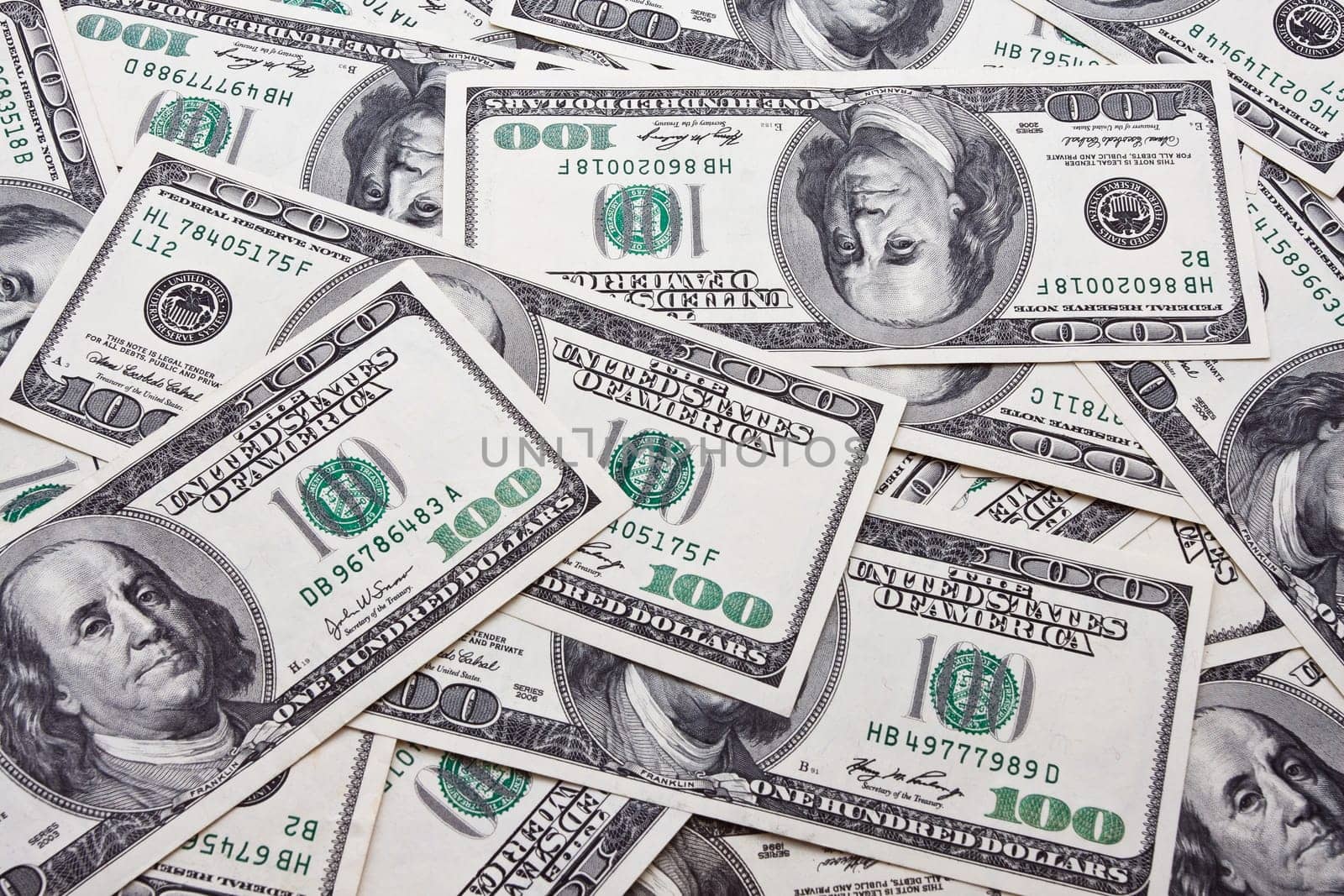 Lots of dollar notes arranged in chaotic manner, background