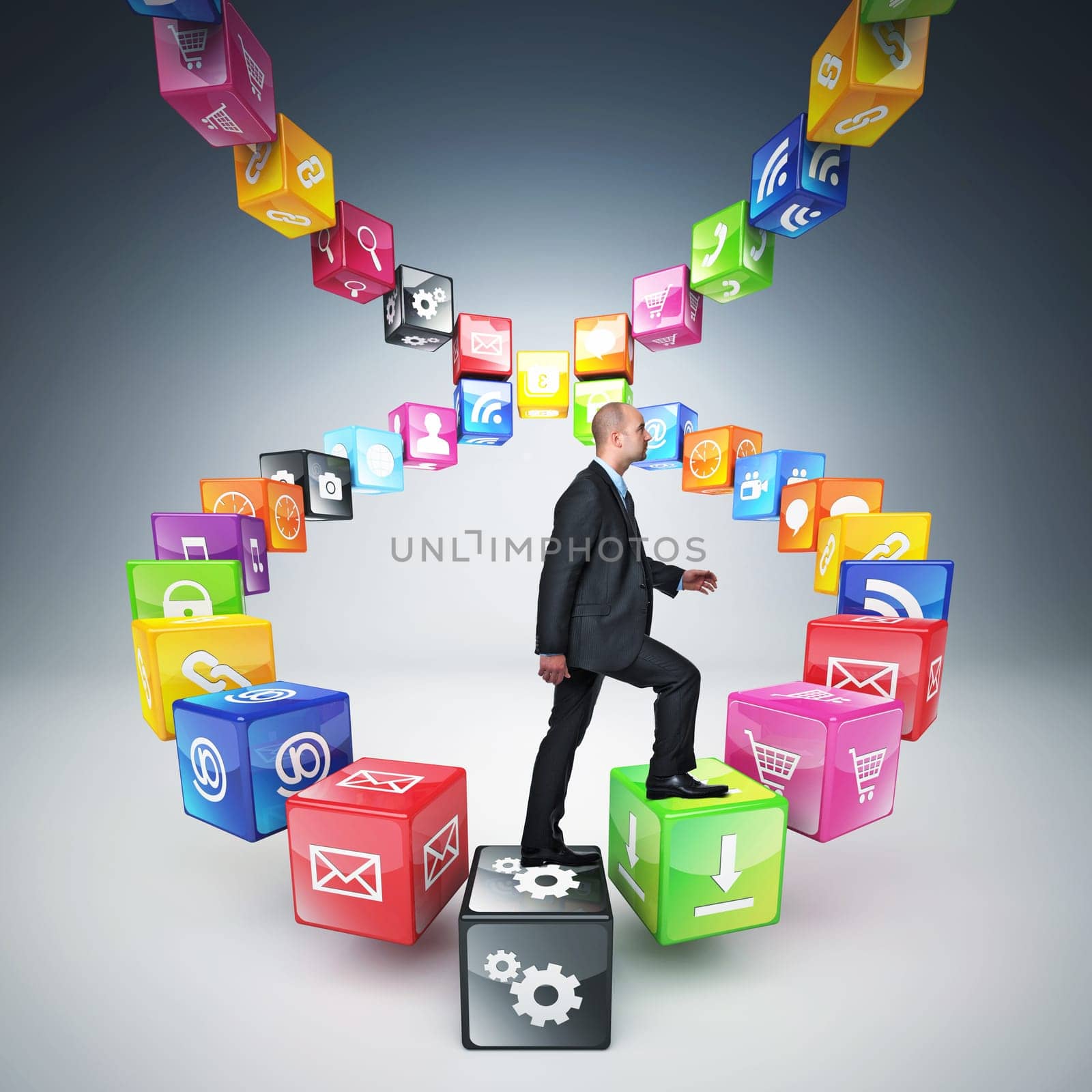 businessman on abstract icons cubes