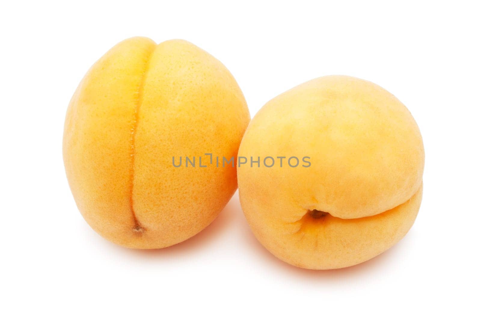 Fresh sweet apricots isolated on white background