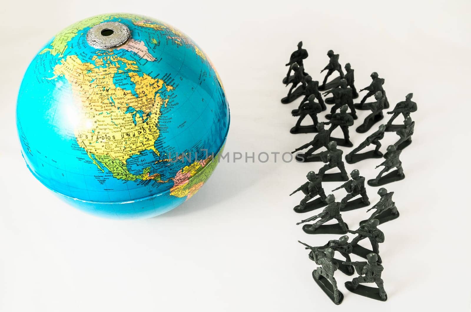 Plastic Lead Soldiers Representing War on a White Background