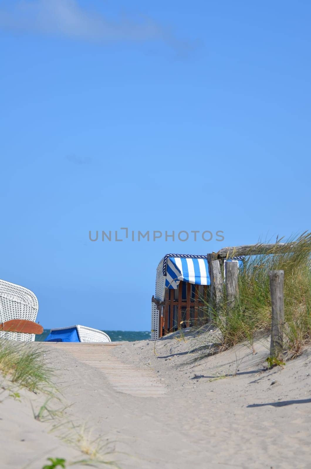 Passage to the beach on the Baltic Sea with beach chair