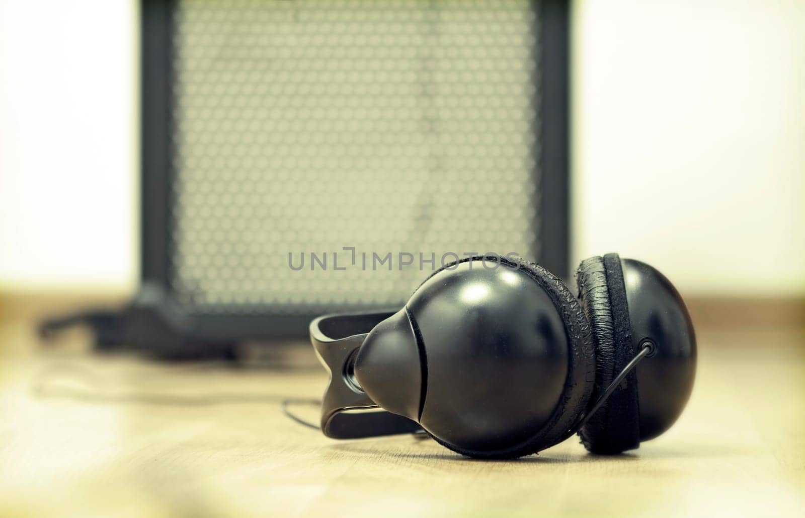 Headphones and guitar amplifier