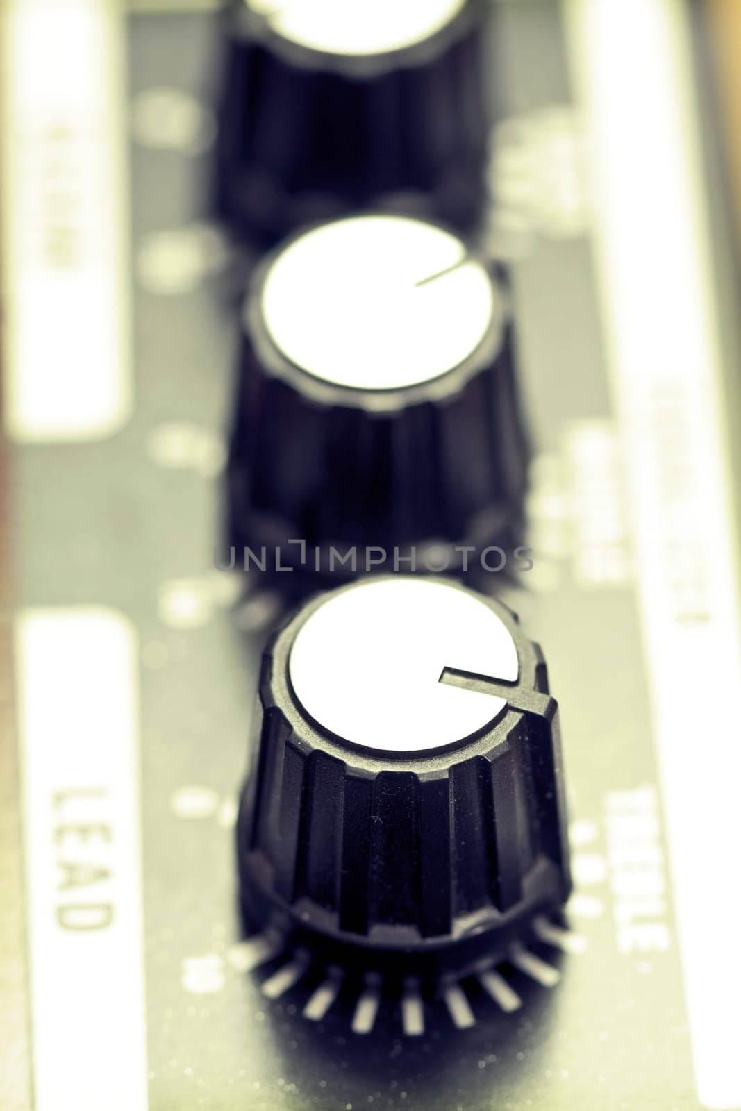 Close up on Guitar amplifier knobs