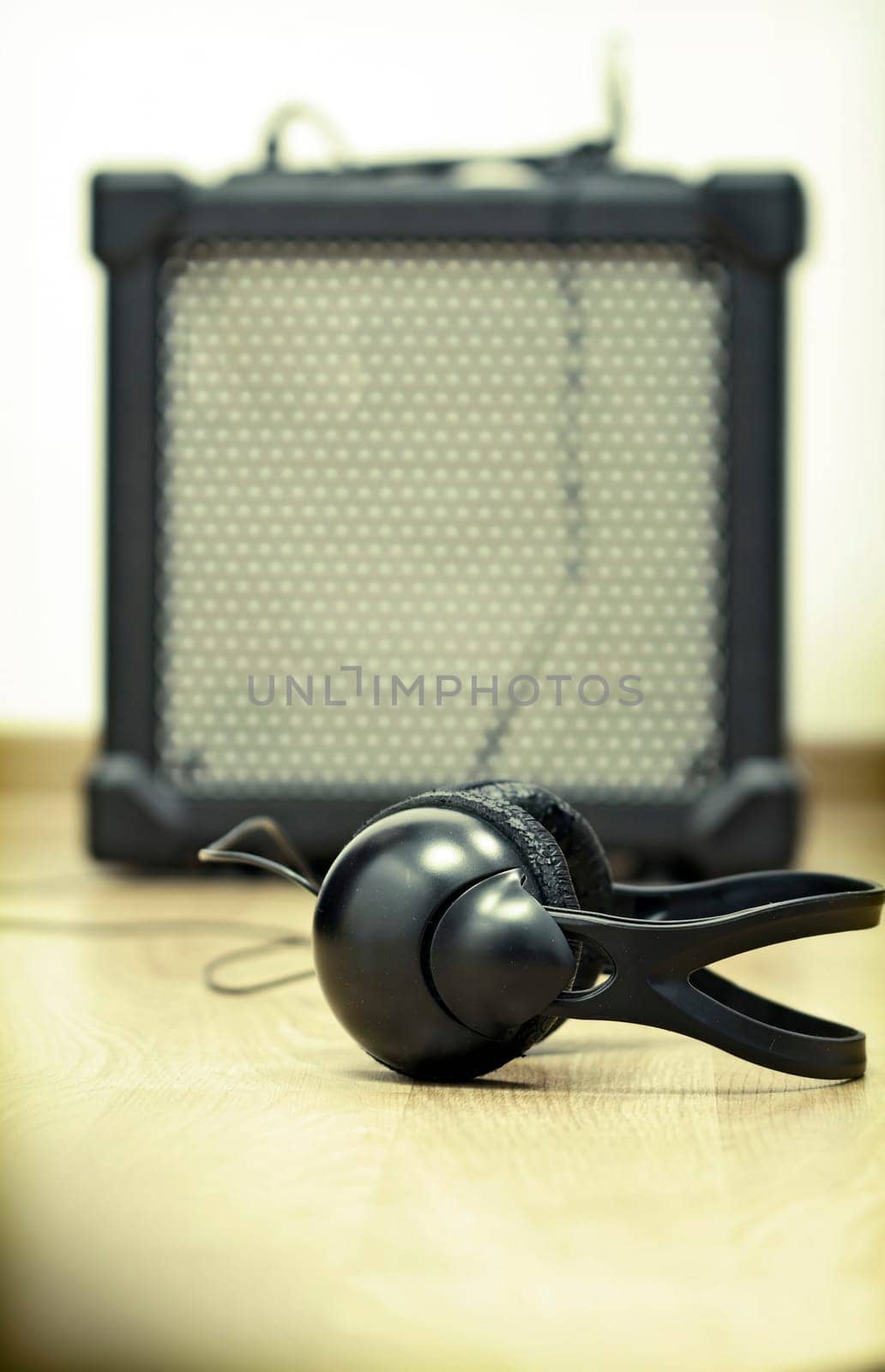 Headphones and guitar amplifier