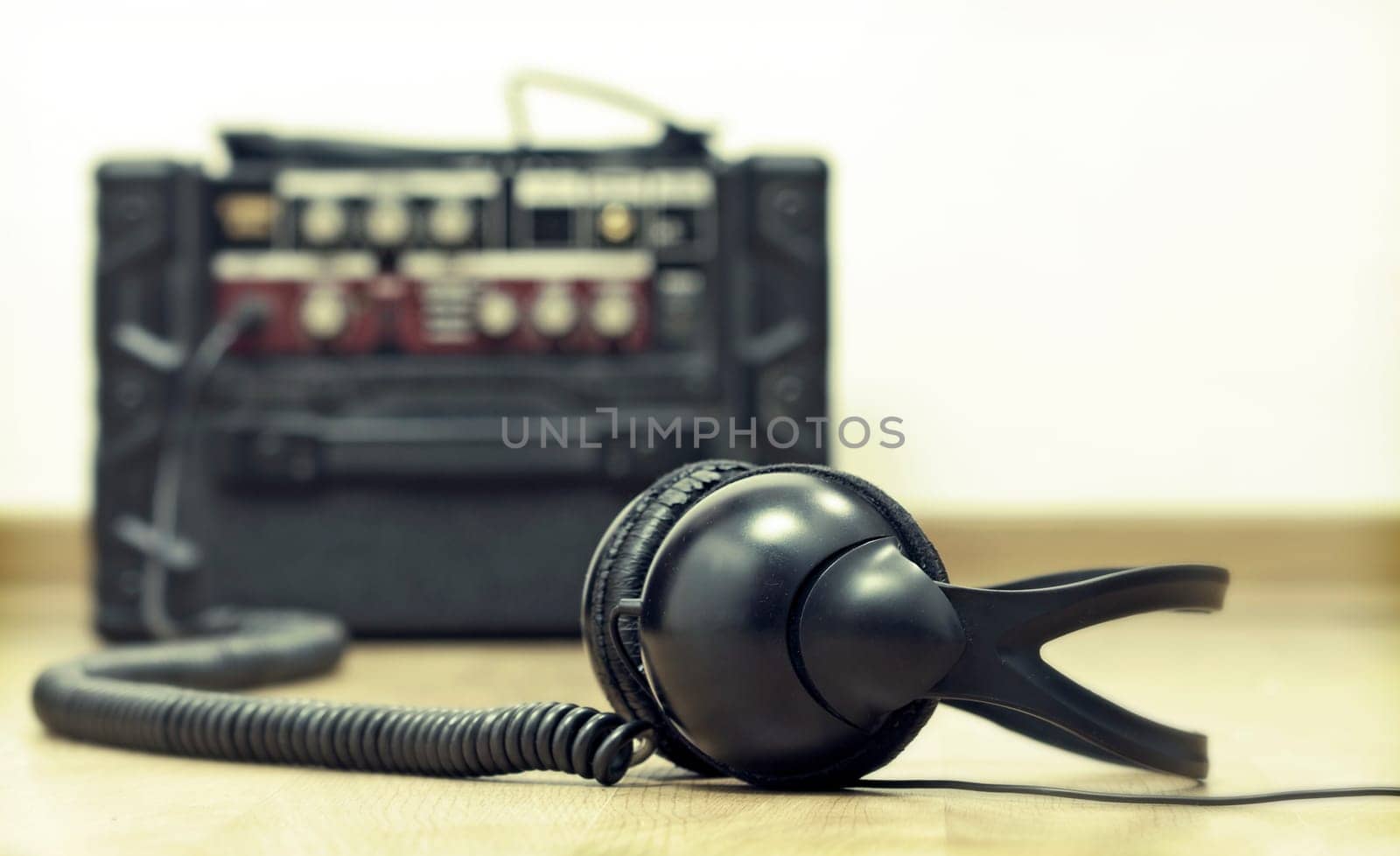 Headphones and guitar amplifier