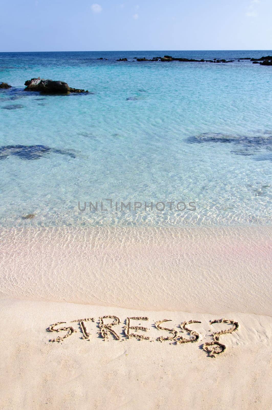 Word Stress written on sand, with a question mark,  relax concept