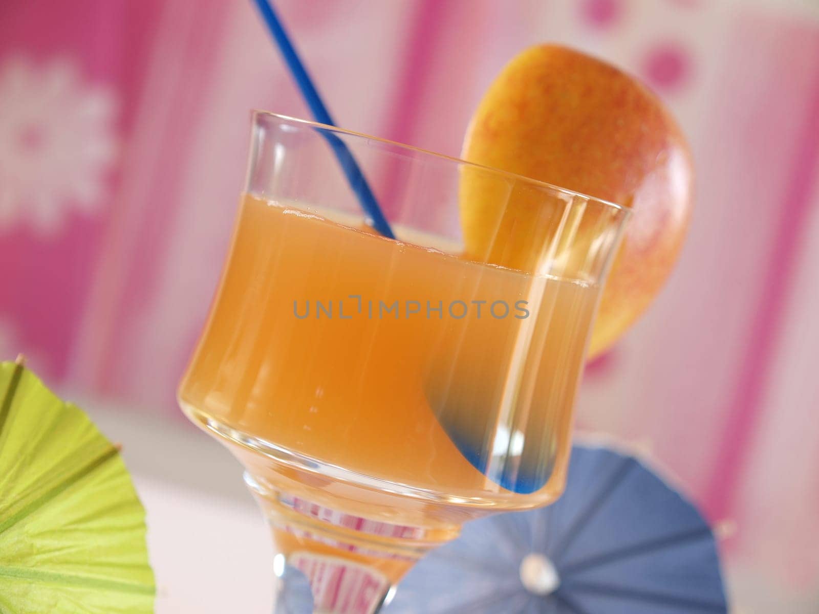Tropical drink in a bar with colorful decoration